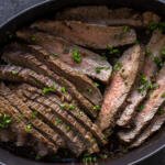 London Broil in a serving pan.