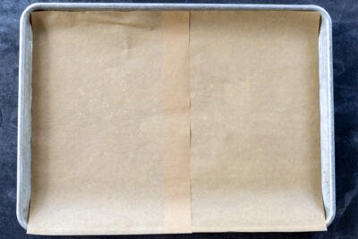 Sheetpan with parchment paper on it.