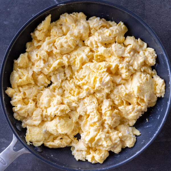 Cooked eggs in a pan.