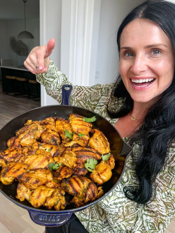 Grilled Chicken Shawarma in a serving tray in Natalyas hands.