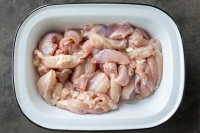 Sliced chicken in a bowl.