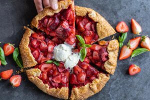 Strawberry Galette with berries around.