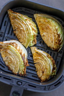 Air fryer cabbage in a basket.