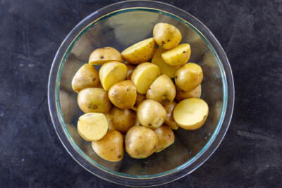 Sliced potatoes in a bowl.