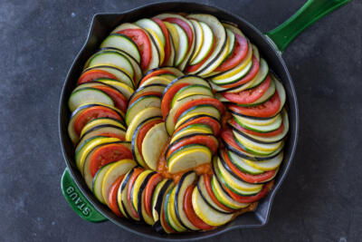 Played out veggies for Ratatouille in a pan.