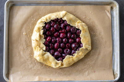 Cherry galette with sugar on the crust.