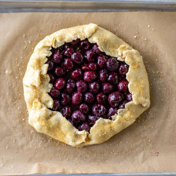 Cherry galette with sugar on the crust.
