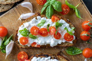 Cottage Cheese Toast with tomatoes and herbs.