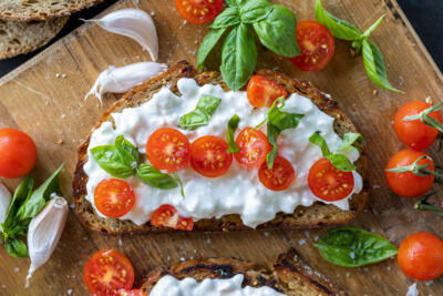 Cottage Cheese Toast with tomatoes and herbs.