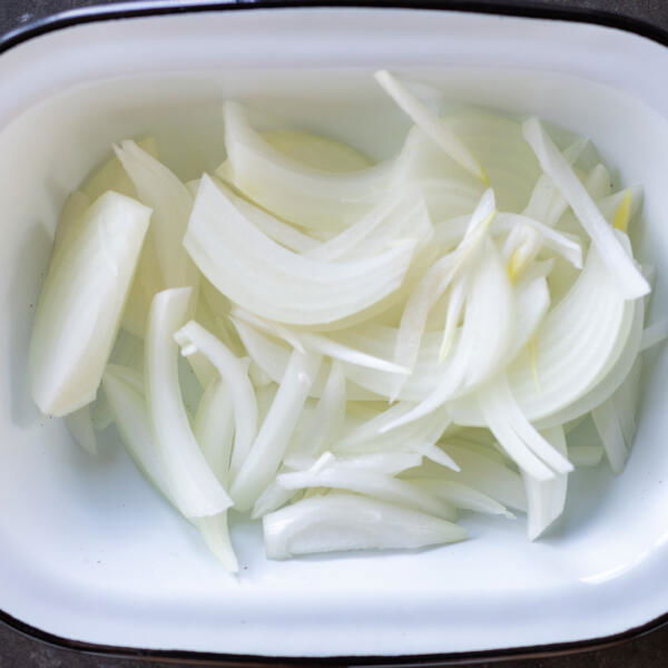 Sliced onion in a pan.