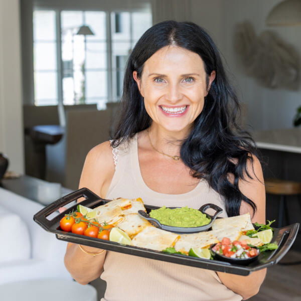 Natalya with Sheet Pan Quesadilla on hand.