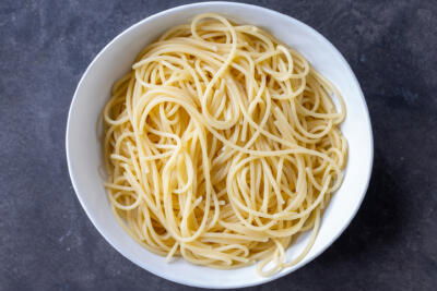 Cooked spaghetti in a bowl.