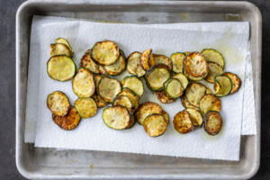 Fried zucchini on a paper towel.