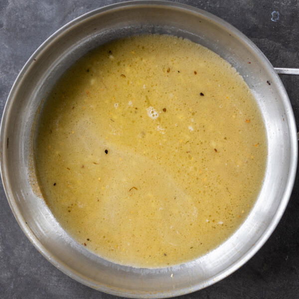 Spaghetti Alla Nerano sauce in a pan.