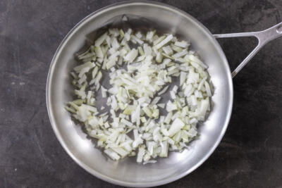 Onion frying in a pan.