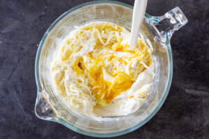Cheese sauce in a cup.