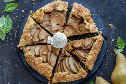 Sliced Pear Galette with ice cream.