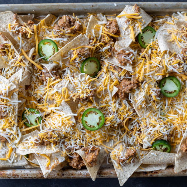 Sheet Pan with chips, cheese and beef mixture.