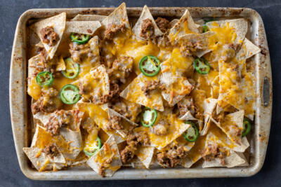 Sheet Pan Nachos with jalapeños.