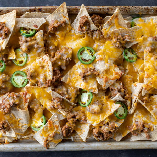 Sheet Pan Nachos with jalapeños.