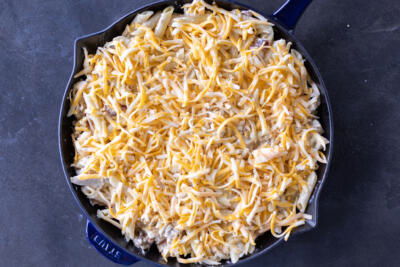 Chicken Bacon Ranch Casserole with cheese on top.