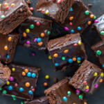 Cosmic Brownies on a counter with sprinkles.