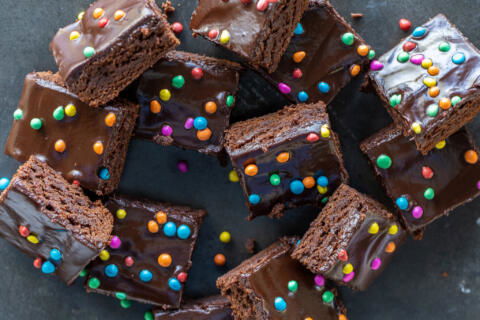 Cosmic Brownies on a counter with sprinkles.
