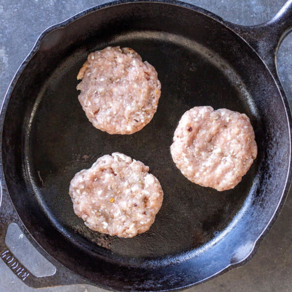 A cooking pan with Homemade Sausage Patties.
