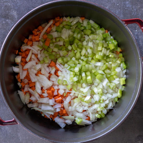 A pot with veggies cooking.