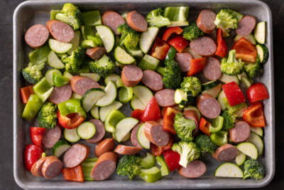 Sheetpan sausage and veggies before baking.
