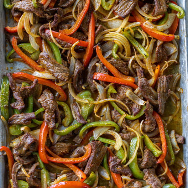 Sheet Pan Steak Fajitas on a pan.