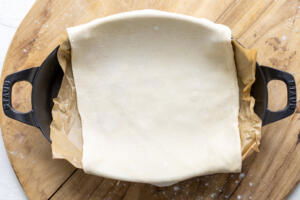 Puff pastry on a baking pan.