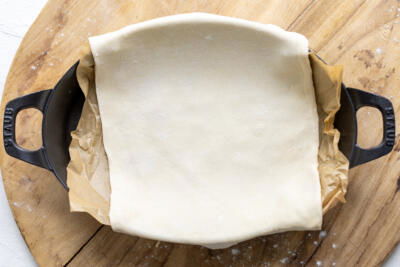 Puff pastry on a baking pan.