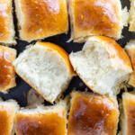 Brioche Dinner Rolls on a tray.