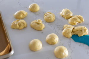 Divided dough into pieces.