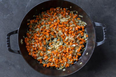 Cooking veggies in a pan.