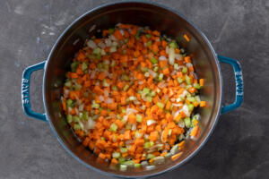 Veggies in a pot sautéing.