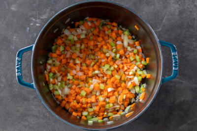 Veggies in a pot sautéing.