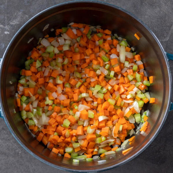 Veggies in a pot sautéing.