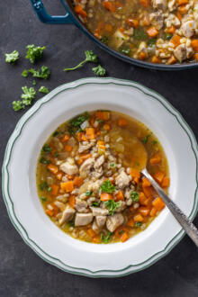 A plate with Chicken Barley Soup.