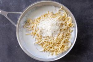 Cottage cheese sauce with pasta and parmesan.