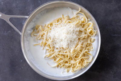 Cottage cheese sauce with pasta and parmesan.