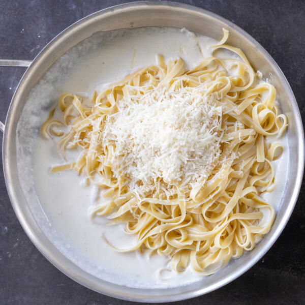 Cottage cheese sauce with pasta and parmesan.