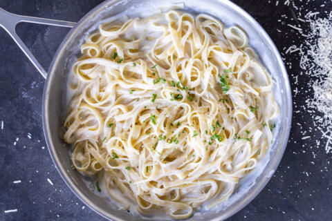 Cottage Cheese Alfredo in a pan with herbs.
