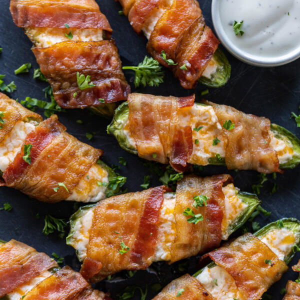 Tray with Bacon Wrapped Jalapeño Poppers.
