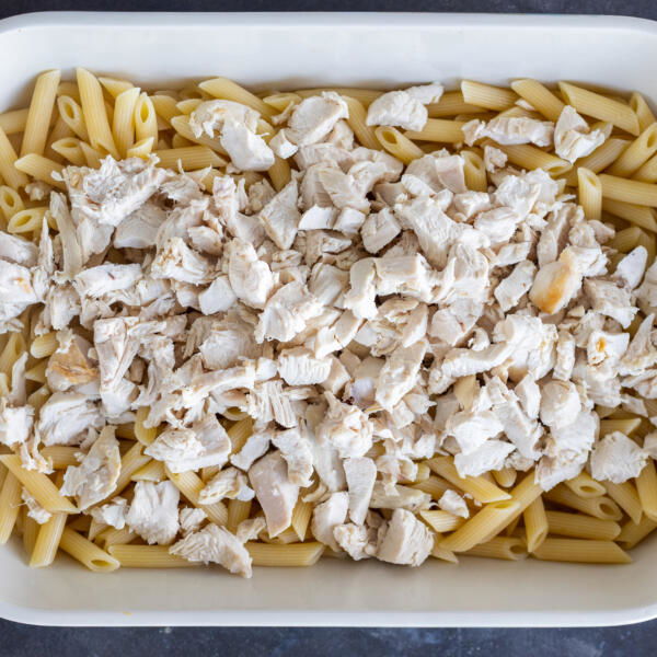 Pasta and chicken in a pan.