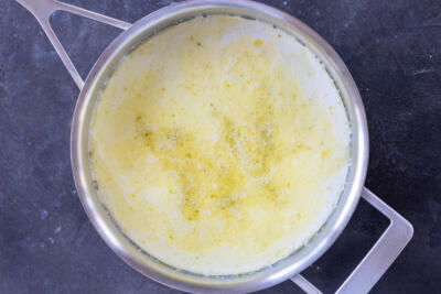 Alfredo sauce ingredients in a pan.