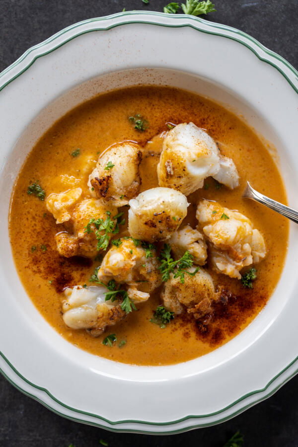 Creamy Lobster Bisque in a serving bowl.
