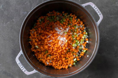 Veggies with seasoning in a pot.