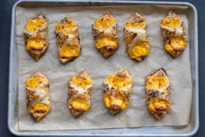Baked Ham and Cheese Puff Pastry on a baking sheet.